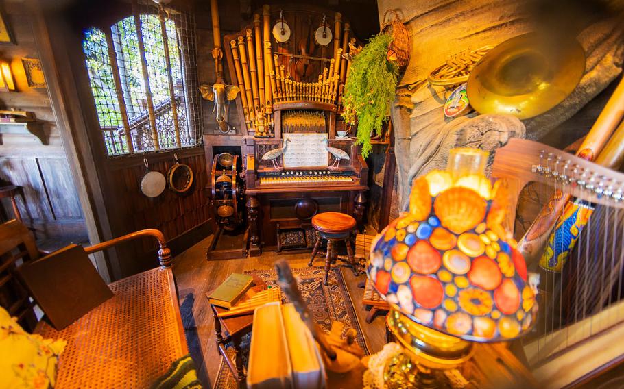 The mother’s room in the newly imagined Adventureland Treehouse, which is filled with musical instruments including a harp, lute, guitar and organ, at Disneyland Park in Anaheim, Calif. 