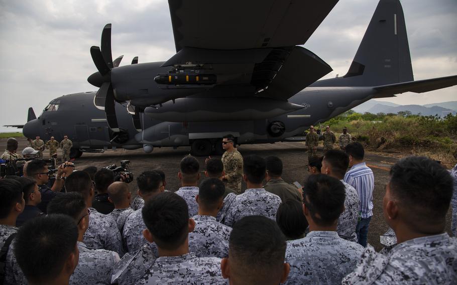 Air Force Capt. Nestor Soriano, an AC-130J Ghostrider instructor pilot, speaks to Philippine navy sailors about the gunship’s capabilities at the former home of Naval Air Station Cubi Point, April 23, 2023.