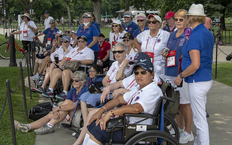 Participants of a special all-female Honor Flight watch members of a Marine Corps drill team perform outside the Lincoln Memorial on the National Mall in Washington, D.C., on Tuesday, May 31, 2022.