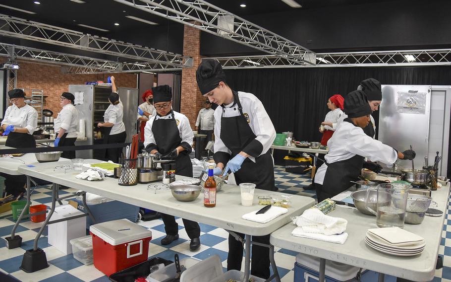 High school students cook against the clock during the Far East Culinary Arts Competition at Yokota Air Base, Japan, Feb. 7, 2023.
