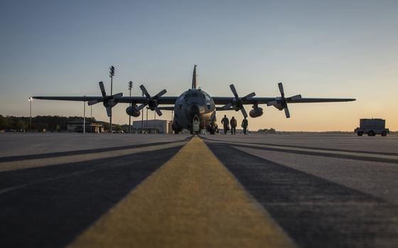 Loadmasters from the 164th Airlift Squadron prepare to begin pre-flight inspections April 11, 2019, at Pope Army Airfield, Fayetteville, North Carolina. Members from the 164th Airlift Squadron participated in training air drops to include personnel drops with the 82nd Airborne Division. (U.S. Air National Guard Photo by Airman 1st Class Alexis Wade)