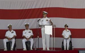 USS Theodore Roosevelt, Bahrain, July 21, 2005: Capt. Daniel C. Grieco, outgoing commanding officer for USS Theodore Roosevelt, makes remarks during a change of command ceremony in Bahrain. The ship is in Bahrain during a short break from an eight-month deployment in the Middle East.  

META TAGS: USS Theodore Roosevelt; CVN 71; Middle East; Bahrain; carrier strike group; deployment; port visit; captain; commander; commanding officer; rear admiral; stars and stripes