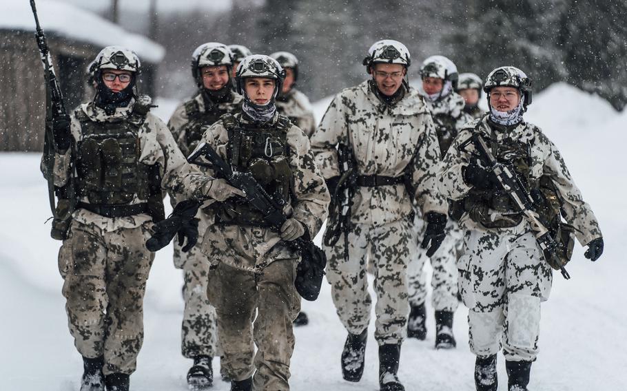 Finnish soldiers switch ranges during weapon familiarization training at Arctic Forge 2023, a U.S. Army Europe and Africa-led exercise, on Sodankyla Garrison, Finland, Feb. 20, 2023. Finland will become the 31st member of NATO on April 4.