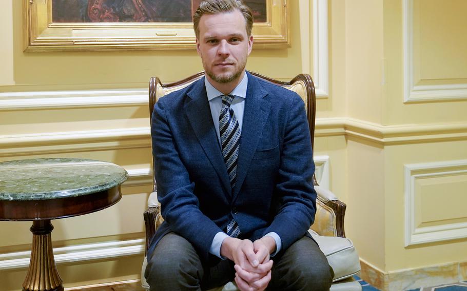 Lithuanian Foreign Minister Gabrielius Landsbergis poses for a photo after an interview with The Associated Press, Monday, March 9, 2022, in Washington. 