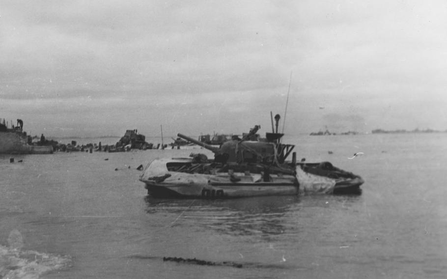 A black and white photo of a floating tank