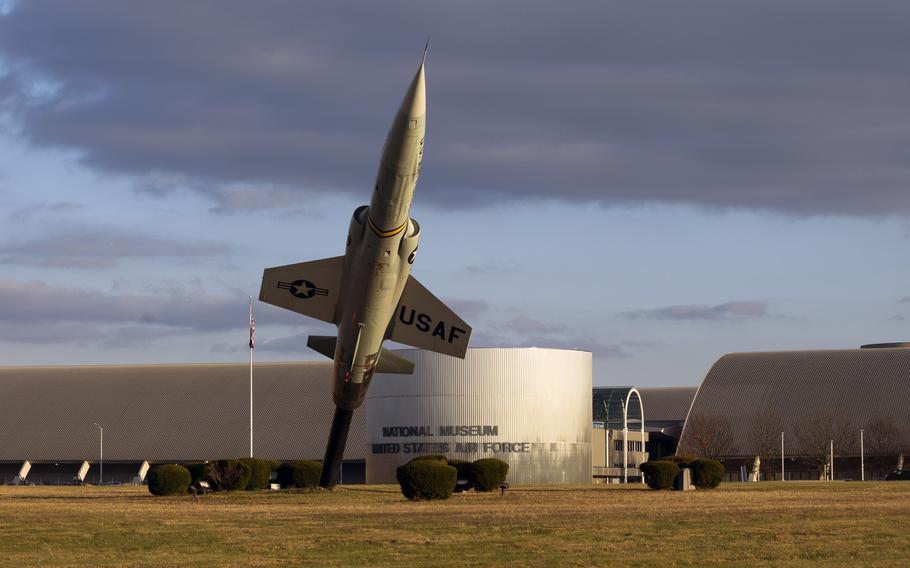 Exterior view of the National Museum of the United States Air Force features a Lockheed F-104 Starfighter. 