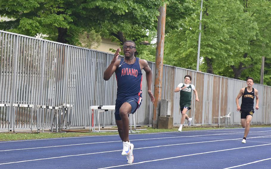 Christian Perkins won the 200 and 400.