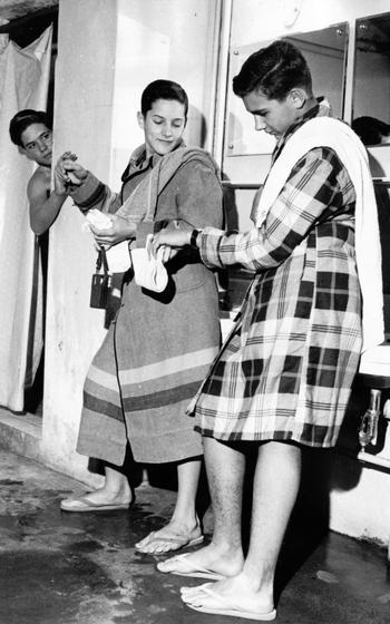 Dan Edson (center) and Richard Beaudry chat as they wait for Keith Jewell to finish up in the shower. The three boys lived with 11 girls and 13 other boys in Pomeroy Hall while attending nearby American High School on the Seoul Area South Command Post.