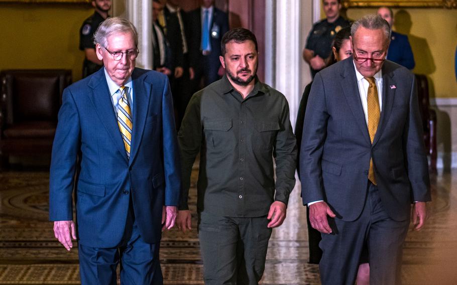 Ukrainian President Volodymyr Zelenskyy on Thursday, Sept. 21, 2023, walks with Senate Majority Leader Chuck Schumer, D-N.Y., right, and Minority Leader Mitch McConnell, R-Ky., as they go to the Senate chamber on Capitol Hill in Washington.