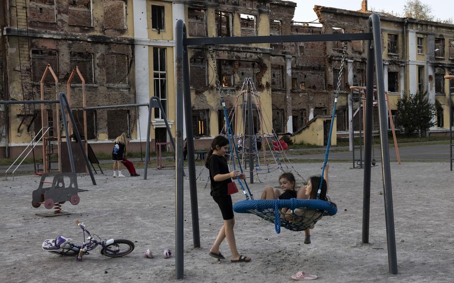 Children on the playground of School No. 134 in Kharkiv, Ukraine, on Monday, Sept. 4, 2023. The school was destroyed during a battle between Russian and Ukrainian forces in February 2022.