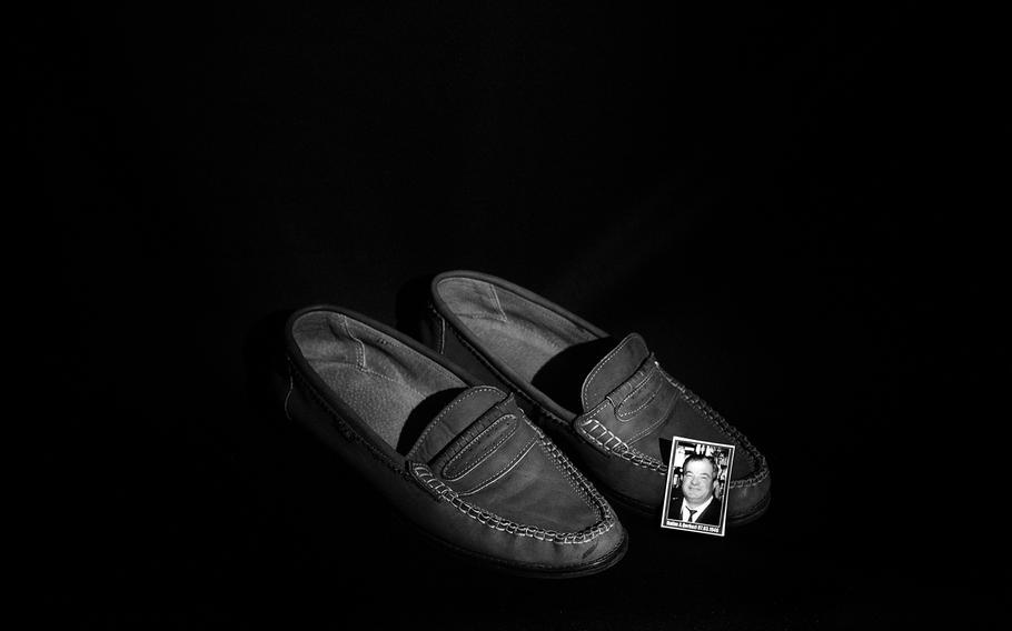 The shoes of Halim Qerkezi, who was born on March 7, 1946. 