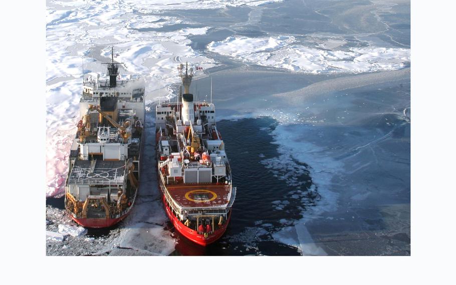 Canadian Coast Guard Ship Louis S. St. Laurent alongside U.S. Coast Guard Cutter Healy in the Arctic Ocean. The United States and Canada are mapping the Arctic seafloor and gathering data to help define the outer limits of the continental shelf in this region. 