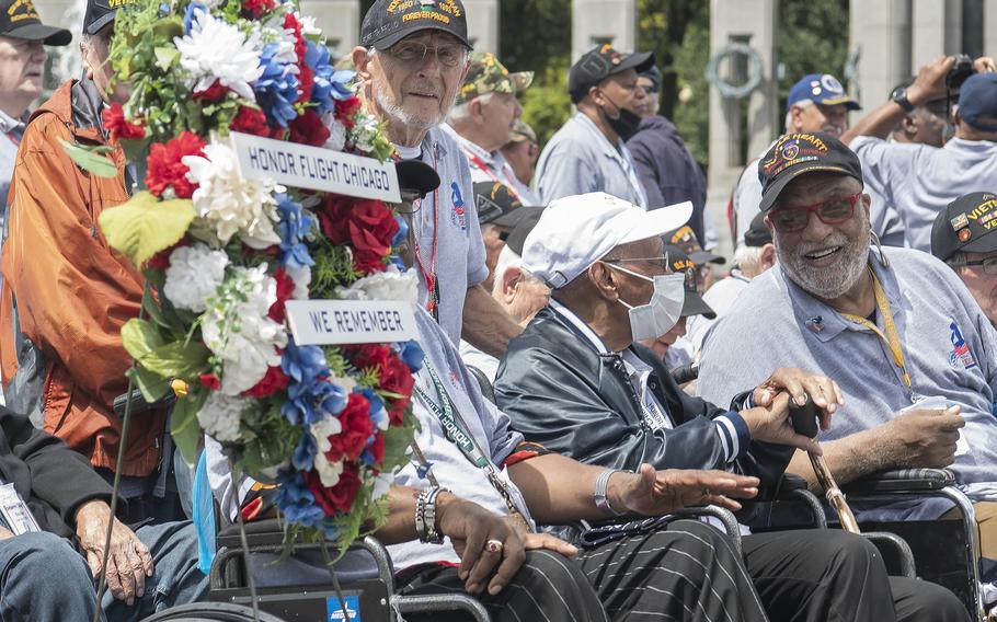 Army veteran Billy Reed, right, shares a laugh with fellow veterans at the World War II Memorial in Washington, D.C., on Wednesday, Aug. 18, 2021, prior to the start of an Honor Flight ceremony that paid tribute to veterans from World War II, the Korean War and the Vietnam War.