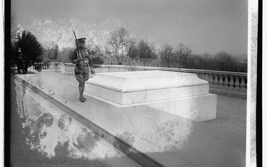 The first military guard at the Tomb of the Unknown Soldier on March 25, 1926. To prevent visitors from climbing or stepping on the tomb, soldiers from Fort Myer, Va., were assigned to guard it during daylight hours beginning in 1926. In 1937, the guard became a 24/7 presence. 