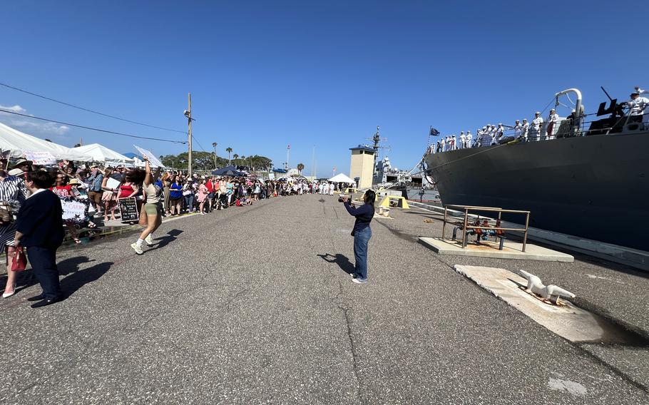 Family and friends of sailors assigned to USS Carney (DDG 64) prepare to reunite with their loved ones during the ship’s homecoming at on Sunday, May 19, 2024, Naval Station Mayport, Fla.