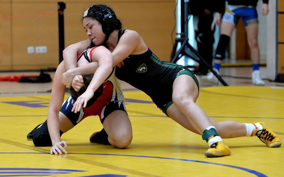 AFNORTH’s Richele Reyes, right, gets a hold on Aviano’s Paige Rogers in a 120-pound, first round match at the DODEA-Europe wrestling finals in Wiesbaden, Germany, Feb. 10, 2023.