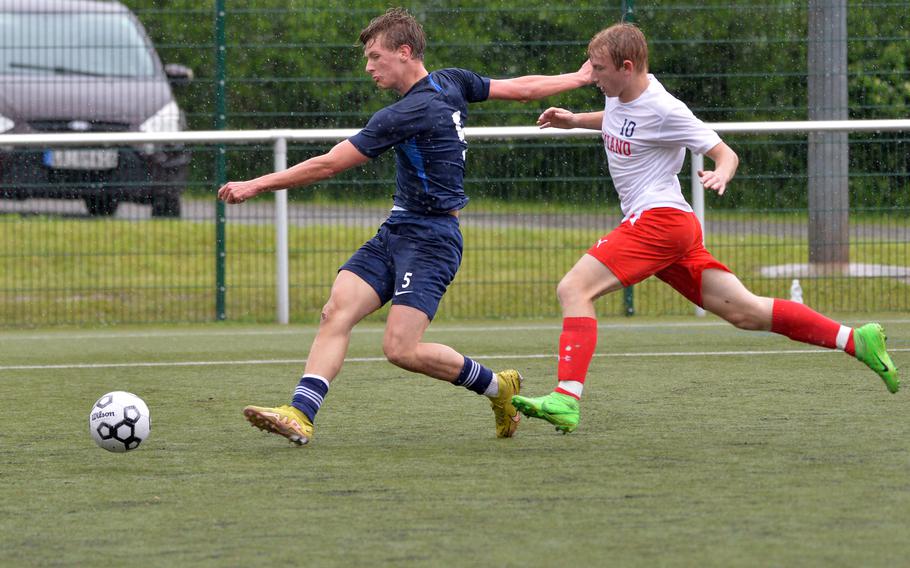 Black Forest Academy’s Jakob Ernst takes a shot on goal after getting past Aviano’s Wyatt McGowan. BFA beat the Saints7-0 in a Division II game at the DODEA-Europe soccer finals at Reichenbach-Steegen, Germany, May 21, 2024. 