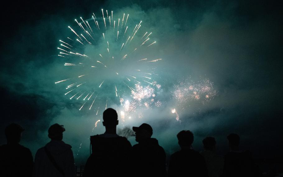 U.S. troops enjoy a massive fireworks display.