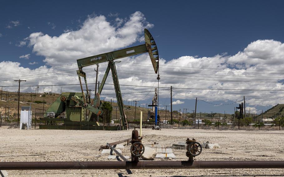 An oil well pump jack operated by Chevron is seen in San Ardo, Calif., on April 27, 2021. 