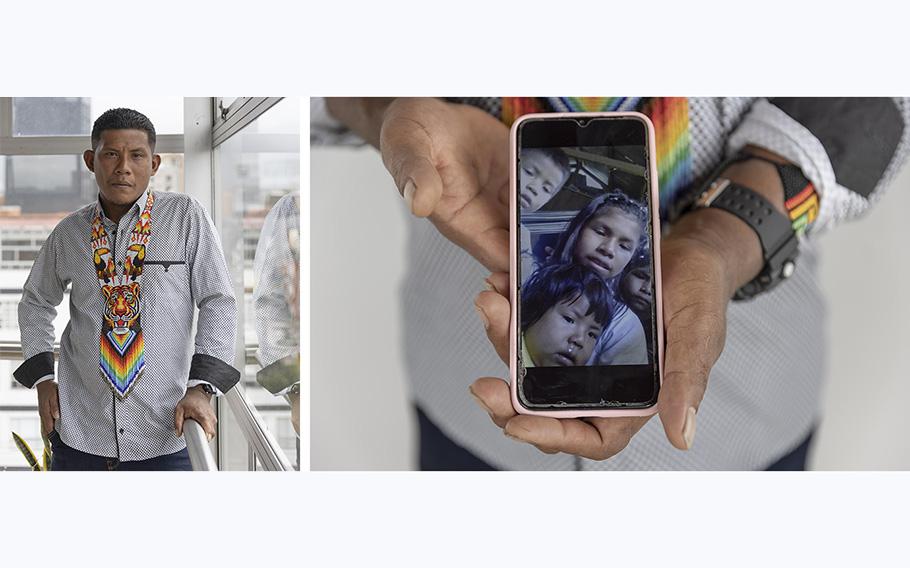 Manuel Miller Ranoque Morales, father of two of the four children whose plane crashed in the Colombian Amazon, shows an image of the four taken in April 2023.