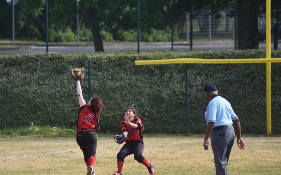 Kaiserslautern’s Xin Ai Robinson makes a running catch during a preliminary-round game against Wiesbaden on Thursday, May 19, 2022, in the DODEA Europe softball tournament.