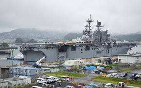The USS Tripoli in port.