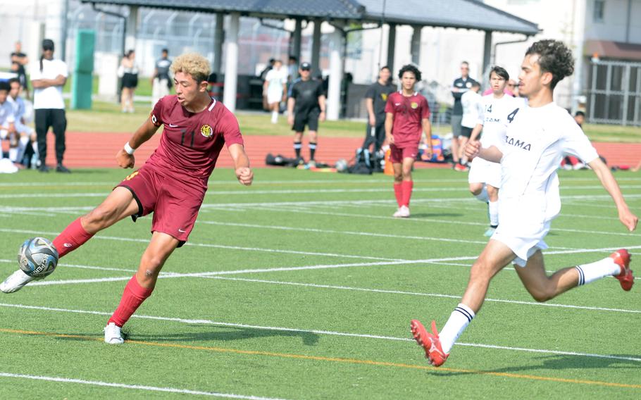 Adrian Santiago-Cruz rushes to try to stop Ren Spinosi.