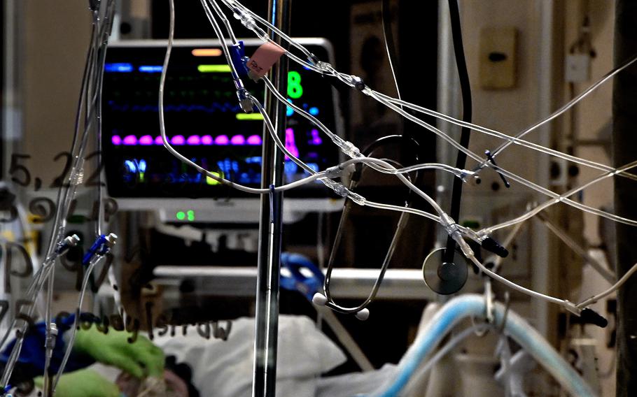Tubes are attached to pumps that regulate the flow of medicine to a critically ill COVID-19 patient at the Stillwater Medical Center in Stillwater, Okla., on Sept. 18, 2021.