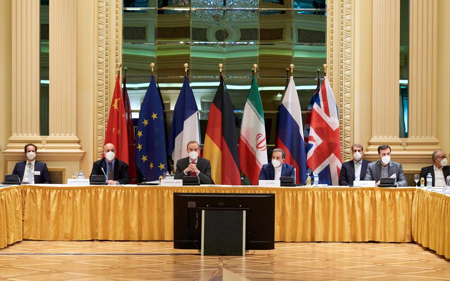 Representatives of the European Union (left) and Iran (right) attend the Iran nuclear talks at the Grand Hotel on April 6, 2021, in Vienna, Austria.