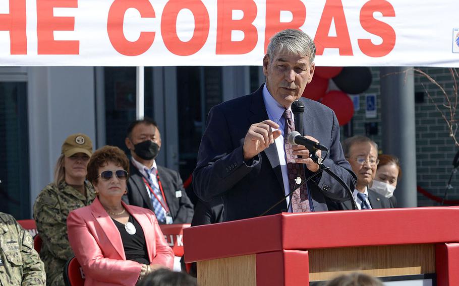 Thomas Brady, director of the Department of Defense Education Activity, speaks during a ceremony for E.J. King Middle and High School at Sasebo Naval Base, Japan, in 2022. Brady is retiring at the end of the school year after heading DODEA since 2014.