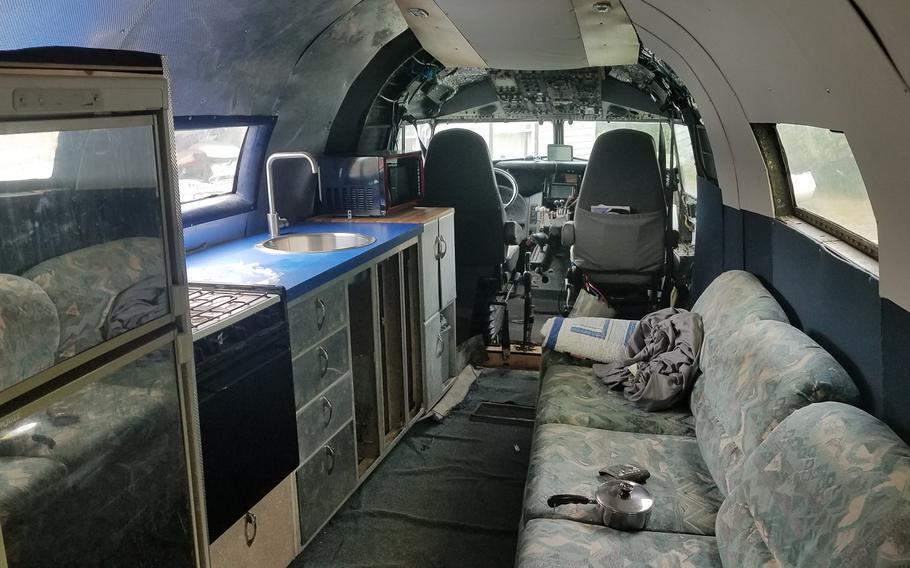 The interior of the R4D after it was remodeled by Air Force retiree Gino Lucci and turned into a motor home. The sink is from another aircraft and the cabinets underneath it were the original radio racks from the R4D.