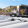 Construction workers demolish a former barracks building on Camp Lejeune, N.C., on Nov. 1, 2023. Dozens of construction projects are under way at the coastal North Carolina Marine base, including some $3.6 billion worth of renovations and new building projects authorized after the catastrophic Hurricane Florence caused major damage to the base in 2018. (Corey Dickstein/Stars and Stripes)