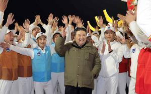 North Korean leader Kim Jong Un celebrates a rocket launch in this image released by the state-run Korean Central News Agency on Nov. 22, 2023.