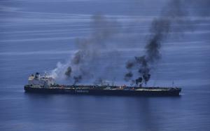 Clouds of smoke rise from the oil tanker Sounion.