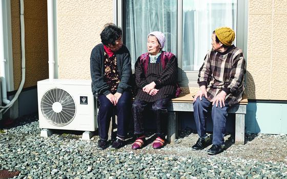 61p bs
James Kimber/Stars and Stripes

Women sit outside a temporary housing unit at Terauchi Daini housing complex Feb. 11, 2016, in Minamisoma, Japan. The women have been living here for five years since the tsunami forced their evacuation and have built a warm community here.