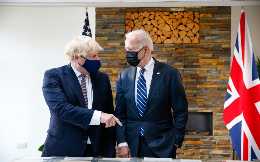 Prime Minister Boris Johnson and President Joe Biden during their bilateral meeting in Carbis Bay, U.K., on June 10, 2021. Virus reproduction numbers published on Friday, Aug. 13, 2021, indicate COVID-19 is in retreat in five of England’s seven regions and in the nation as a whole, good news for Johnson.