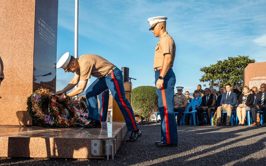 Marines lay wreaths at the Guadalcanal American Memorial.