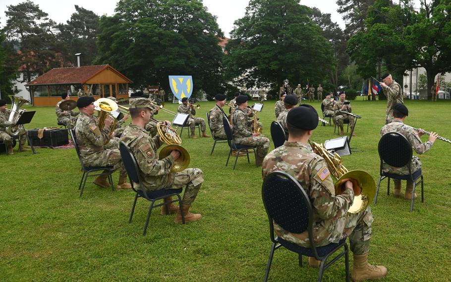 The U.S. Army Europe and Africa Band plays at the 21st Theater Sustainment Command’s change of command ceremony at Daenner Kaserne, Kaiserslautern, Germany, June 8, 2021. Brig. Gen. James Smith took command from Maj. Gen. Christopher Mohan at the ceremony.