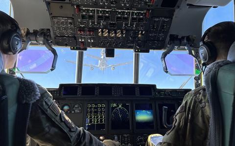 Contractor refuels B-52 bomber, Super Herc over the Pacific Contractor refuels B-52 bomber, Super Herc over the Pacific