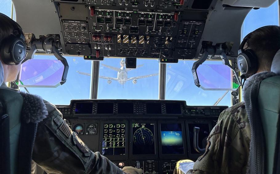 An MC-130J Commando II out of Kadena Air Base, Okinawa, approaches an Omega KDC-10 commercial air-to-air refueler over the Pacific Ocean on March 10, 2024.