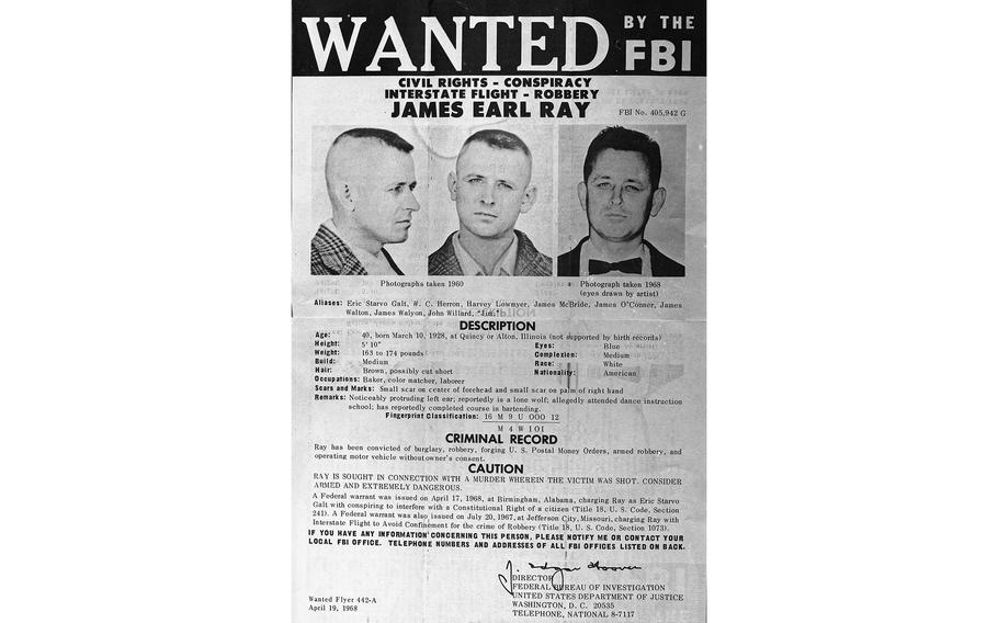 A wanted poster shows fugitive James Earl Ray.