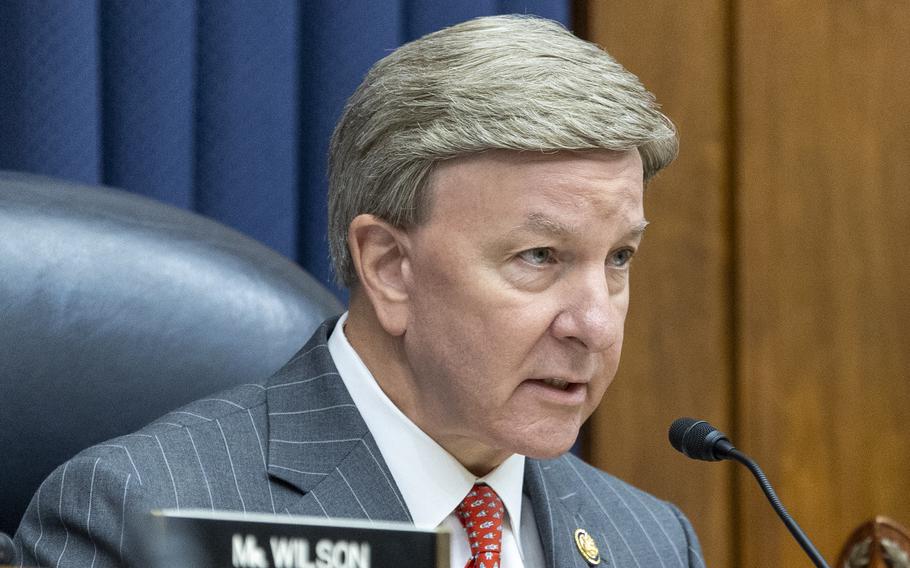 Rep. Mike Rogers sitting and speaking.