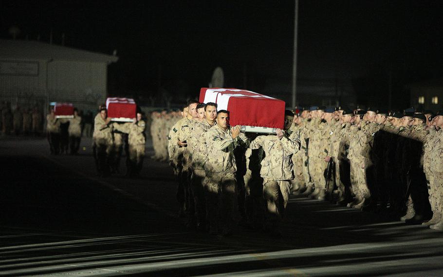 More than 3,000 soldiers from NATO countries lined the ramp at Kandahar Airfield in March 2009 to pay final respects to four Canadian troops killed in makeshift bomb explosions. Maj. Gen. Wayne Eyre, acting head of Canadian forces, wrote a public letter acknowledging questions about the legacy of their time in Afghanistan, after the Taliban took control of Panjwai district in southern Kandahar province, where many Canadians fought and died.