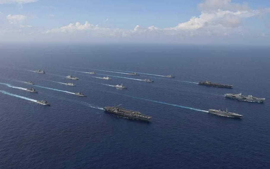 The aircraft carriers USS Ronald Reagan, USS Carl Vinson and HMS Queen Elizabeth join the Japanese helicopter destroyer JS Ise in leading vessels from six nations through the Philippine Sea near Okinawa in this undated photo from the Japan Maritime Self-Defense Force. 