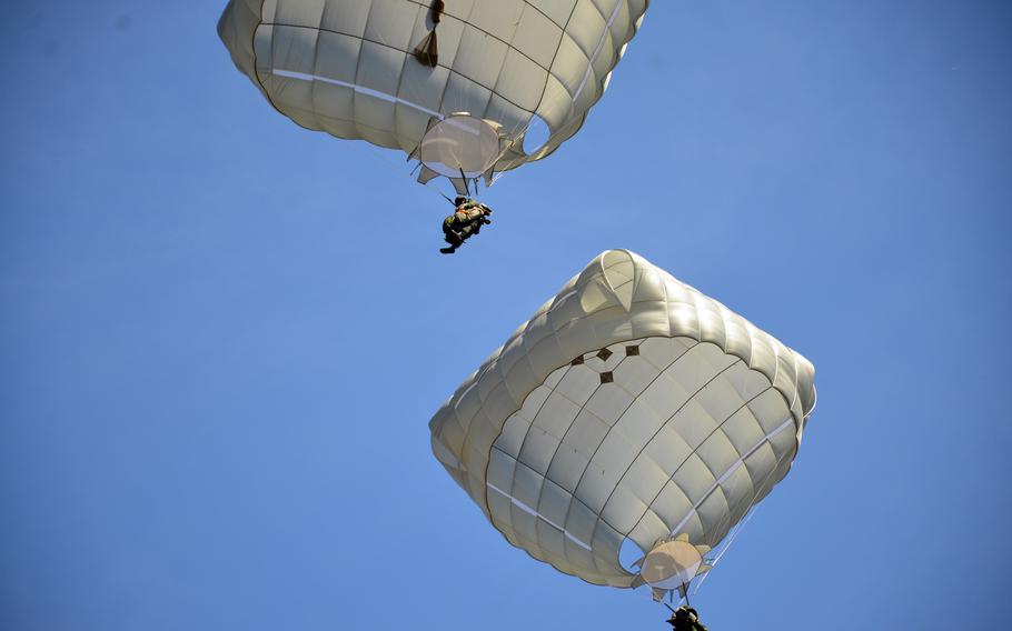 U.S. and Thai paratroopers prepare to land in central Thailand, March 5, 2024, during the Cobra Gold exercise.