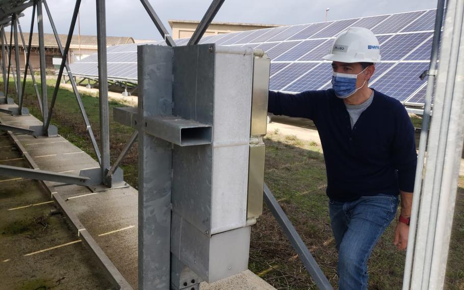 Antonino Piluso checks gauges on a photovoltaic system control panel at Naval Air Station Sigonella, Italy, in 2021. The base and the Sigonella military community are dealing with a steep rise in energy prices, which is inflating utility bills.
