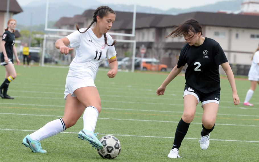 E.J. King's Maliwan Schinker and Zama's Sarah Larm are two returning D-II All-Tournament players.