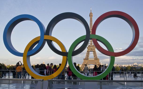 The Olympic rings are set up at Trocadero plaza that overlooks the Eiffel Tower in Paris on Sept. 14, 2017. The United States and China are expected to finish 1-2 in the gold and the overall medal counts at the Paris Olympics, which open in 100 days.