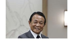 Former Japanese Prime Minister Taro Aso attends an event at the presidential office in Seoul, South Korea, on Nov. 2, 2022. 