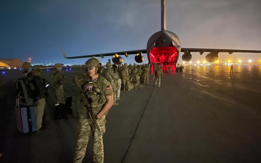 Paratroopers assigned to the 82nd Airborne Division prepare to board a U.S. Air Force C-17 on Aug. 30, 2021, at the Hamid Karzai International Airport. 